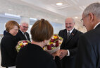 Belarus President Alexander Lukashenko gives presents to the presidents of Germany and Austria Frank-Walter Steinmeier and Alexander Van der Bellen and their spouses