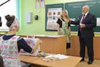 During the visit the head of state went to the workshops where students are taught to work with fabrics and wood