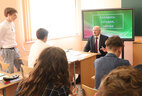 Aleksandr Lukashenko gives the first lesson to a class of senior school students