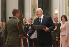 Graduate of the Air and Space Defense Academy at the Russian Defense Ministry Ivan Lemeshevsky receives a letter of commendation from the President