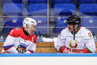Aleksandr Lukashenko and Vladimir Putin team up for an ice hockey game at Shayba Arena in Sochi