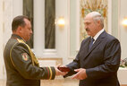 The Order for Service to the Motherland Third Class is awarded to the first deputy chairman of the State Border Committee Major-General Igor Butkevich