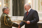 The official letter of thanks from the President of Belarus is presented to first deputy chairman of the Grodno Oblast organization of the Belarusian Public Association of Veterans Alexander Korolenko