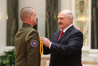 Medal for Saved life is conferred on Maksim Novikov, commander of the guard of the firefighting department of the Kostyukovichi District emergencies department