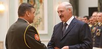 Belarusian President Alexander Lukashenko presents general’s shoulder boards to senior officers, 15 July 2014