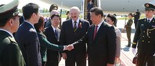 President of the Republic of Belarus Alexander Lukashenko welcomes President of the People’s Republic of China Xi Jinping at the National Airport Minsk, 10 May 2015
