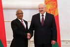Belarus President Aleksandr Lukashenko and Ambassador Extraordinary and Plenipotentiary of Ethiopia to Belarus Alemayehu Tegenu