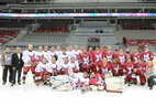 Participants of the friendly ice hockey match