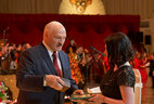 Yulia Beshanova, a commentator for the STV TV channel, receives a letter of commendation from the Belarusian President