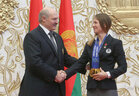 Alexander Lukashenko bestows the Hero of Belarus star upon three-time Olympic champion Darya Domracheva