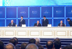 Alexander Lukashenko, Nursultan Nazarbayev and Vladimir Putin sign the Eurasian Economic Union Treaty