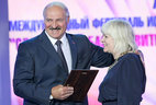 Alexander Lukashenko presents Union State prize in literature and art to specialist in architecture Inessa Slyunkova (Russia)