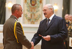 Major-general’s shoulder boards are presented to Vladimir Archakov