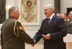 Major-general’s shoulder boards are presented to Sergei Simonenko