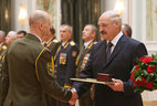 The Belarusian President officially thanks graduate of the command and staff department of the Military Academy of the Republic of Belarus Lieutenant Colonel Dmitry Burets