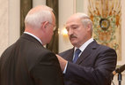Alexander Lukashenko presents the Order of the Fatherland Third Class to Chairman of the Minsk City Hall Nikolai Ladutko