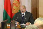 Alexander Lukashenko hears out a report from the Grodno Oblast Governor on the social and economic development of the region