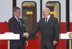 President of Belarus Alexander Lukashenko and CEO of Stadler Rail Group Peter Spuhler attend the ceremony to open the plant