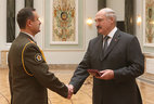 The Order for Service to the Homeland 3rd Class is presented to Colonel Alexander Minov
