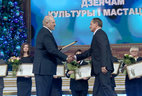 Alexander Lukashenko presents the award to director of the Brest Hero Fortress Memorial Grigory Bysyuk