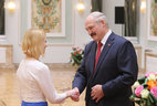 Alexander Lukashenko presents the Order of Mother to Yelena Kostrova