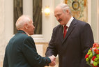 Alexander Lukashenko presents the Order of Fatherland 3rd Class to Viktor Kostko, first deputy chairman of the council of the Minsk City organization of veterans of the Belarusian Public Association of Veterans