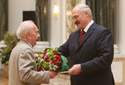 The official letter of thanks from the President of Belarus is presented to chairman of the committee of the Great Patriotic War veterans of the Brest Oblast organization of the Belarusian Public Association of Veterans Alexei Kot