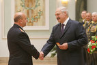 Piotr Vrublevsky receives shoulder boards of the major general of justice