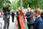 Alexander Lukashenko lays a wreath at the National September 11 Memorial in New York