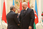 Belarus President Alexander Lukashenko presents the Order of Honor to Azerbaijan First Vice Premier Yagub Eyubov