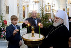 Alexander Lukashenko and Metropolitan Pavel at the Holy Spirit Cathedral