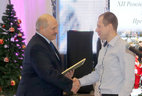 The Belarus President’s ice hosckey players are officially thanked by Alexander Lukashenko for the victory at the 12th Christmas International Amateur Ice Hockey Tournament. The award is presented to Alexei Plotnikov