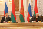 Alexander Lukashenko and Vladimir Putin sign a number of documents after the session of the Union State Supreme State Council