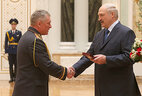 Deputy Interior Minister Nikolai Melchenko is awarded the Order for Service to the Homeland 3 Class