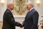 Head of the economic policy chair of the Belarusian State Economic University Alexander Bondar receives the Honored Worker of Education of Belarus title