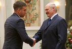 Sports director of the Belarusian modern pentathlon federation Mikhail Prokopenko receives the Honored Master of Sport of Belarus title