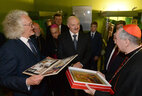 Belarus President Alexander Lukashenko and Secretary of State of the Holy See Cardinal Pietro Parolin. Cardinal Pietro Parolin visit the exhibition of Belarusian icons of the 17th-21st centuries at the museum of the Vatican. Alexander Lukashenko presented a modern Belarusian icon to the museum and a set of stamps with religious ornaments to Cardinal Pietro Parolin