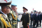 Alexander Lukashenko and commanders of military units, who took part in the military parade