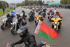 The column of bikers rides from the Mound of Glory