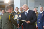 The official letter of thanks of the President was presented to graduate of the command and staff department of the Military Academy of the Republic of Belarus lieutenant colonel Dmitry Dovger