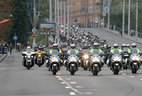 The column of bikers arrives at the Sports Palace