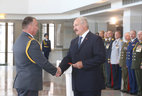 Alexander Lukashenko presented shoulder straps of the major general of police to Igor Yevseyev