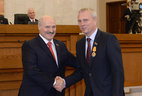 Director General of ZAO Stolichnoye Televideniye Yuri Koziyatko receives the Order of Honor