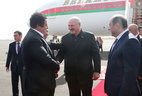 Belarus President Alexander Lukashenko is welcomed by President of Armenia’s National Olympic Committee Gagik Tsarukian and Armenia Economy Minister Suren Karayan