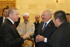 Belarus President Alexander Lukashenko and Turkey President Recep Tayyip Erdogan attend the opening ceremony of the Cathedral Mosque in Minsk