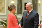 Alexander Lukashenko presents the Order of Mother to Tatyana Prikhodko