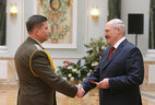 Alexander Lukashenko presents major general’s shoulder boards to Sergei Terebov