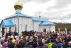 Alexander Lukashenko talks to local residents after the visit to the church