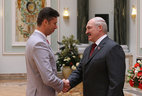 Belarus President Alexander Lukashenko presents the Order of Honor to Vladimir Samsonov