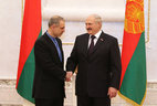 Belarus President Alexander Lukashenko and Ambassador Extraordinary and Plenipotentiary of Iran to Belarus Mostafa Oveisi
